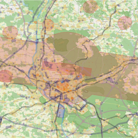 Das Bild zeigt eine detaillierte Karte mit verschiedenen Regionen, Straßen und geografischen Merkmalen. Farbige Markierungen und Kreise heben bestimmte Zonen oder Interessensbereiche hervor.
